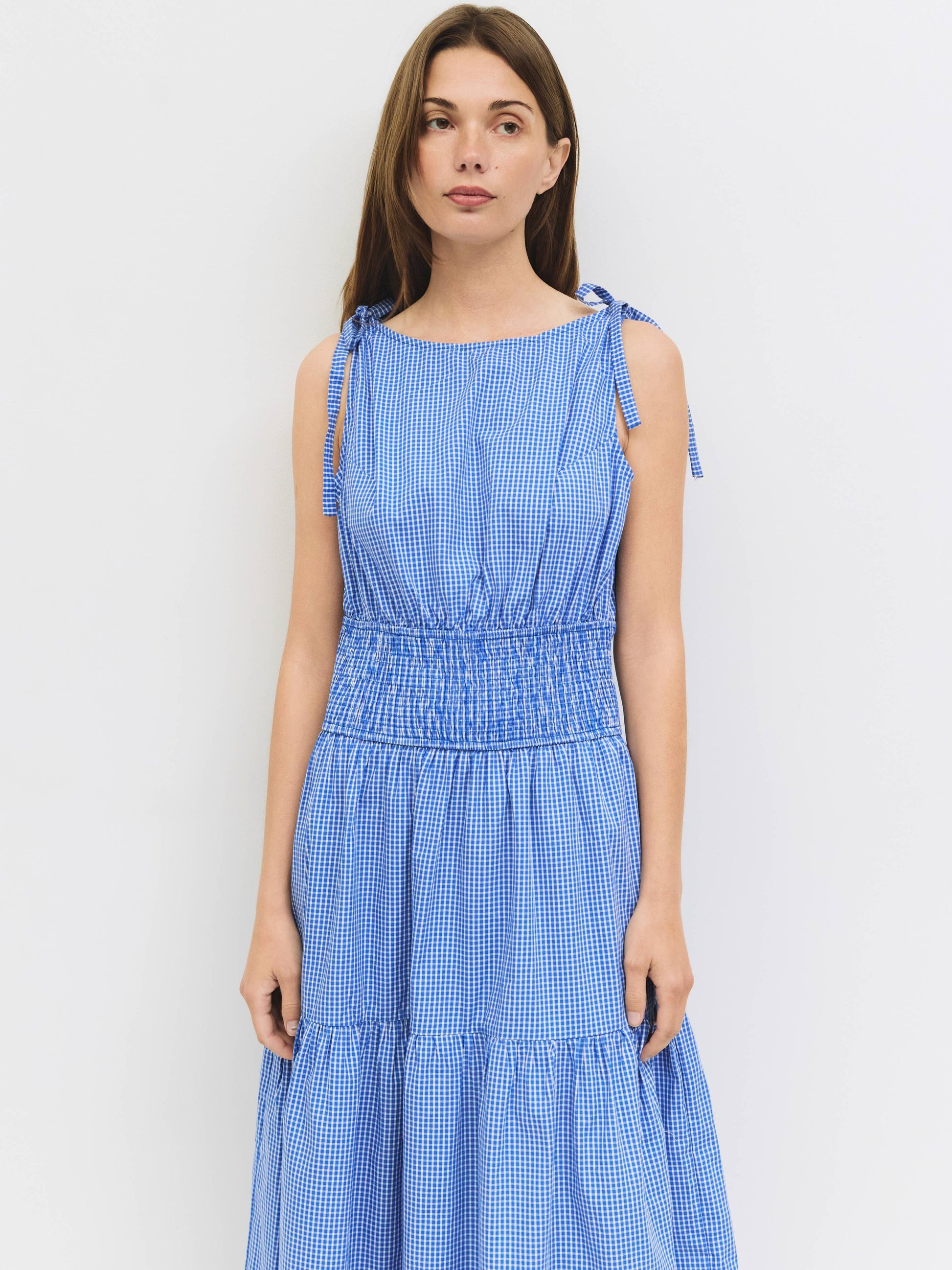 picnic dress Cosmic Floral XS / Cosmic Floral Classic white cotton fabric No additional layering required Functional strawberry buttons Smocked waistline Modest midi length Side pockets 100% Cotton Machine wash cold Mahon Linen Dress - Zimmermann,